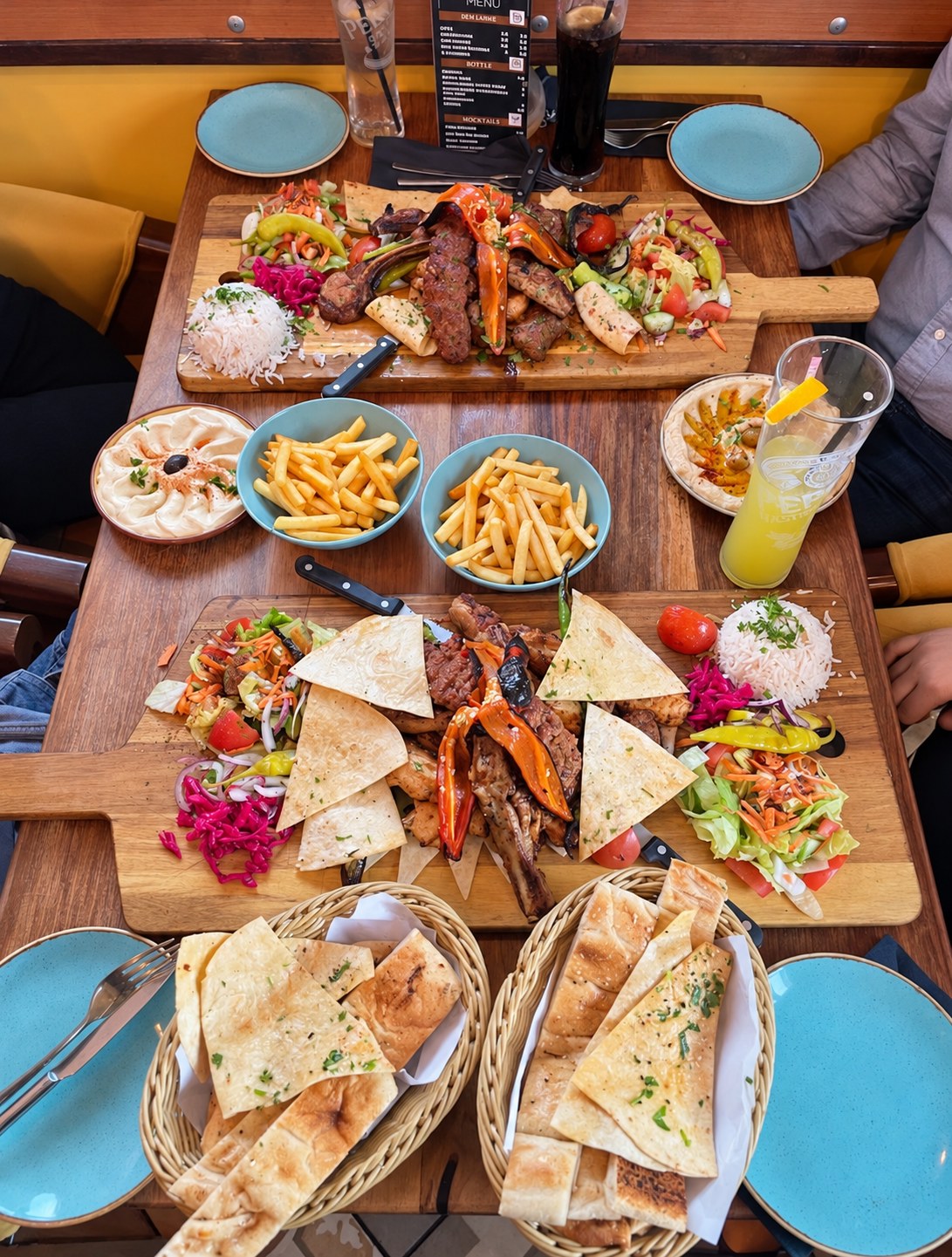Mixed charcoal grills, meze, rice and fresh bread served at Babylon